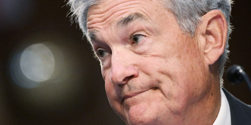 U.S. stocks recover early losses to trade mixed; Powell says Fed strongly supports more hikes
