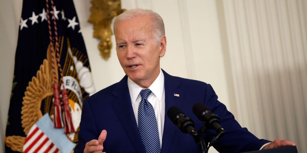 AI will require ‘some new laws,’ Biden says, even as tech giants agree to safeguards