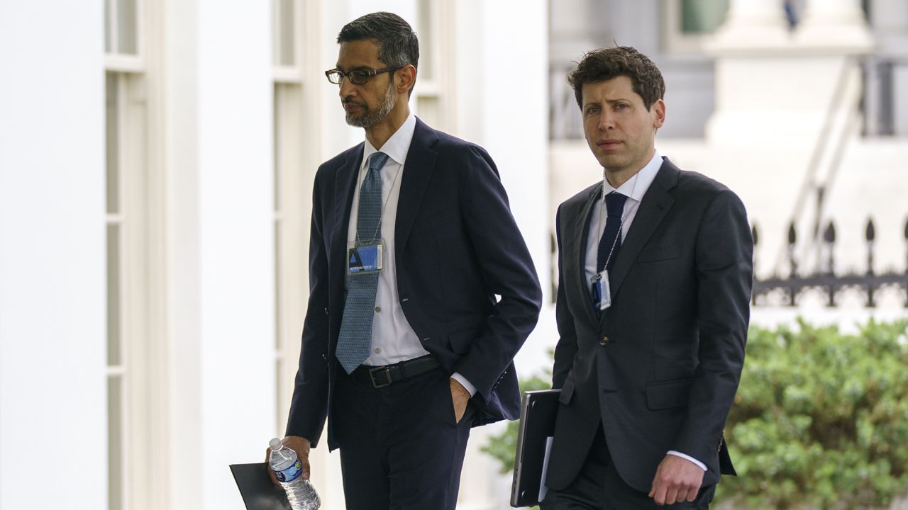Alphabet CEO Sundar Pichai, left, and OpenAI CEO Sam Altman arrive to the White House for a meeting with Vice President Kamala Harris on artificial intelligence, Thursday, May 4, 2023, in Washington.