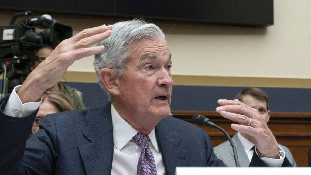 Stocks fall as Fed’s Powell confirms more rate hikes this year