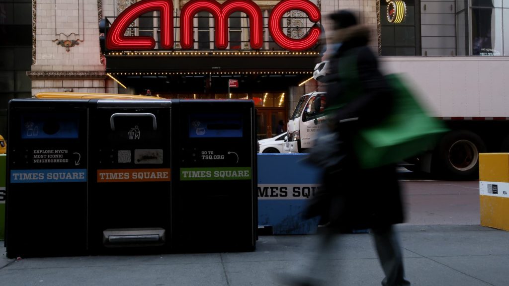 Stocks making the biggest moves premarket: AMC Entertainment, Domino’s Pizza, Tesla and more