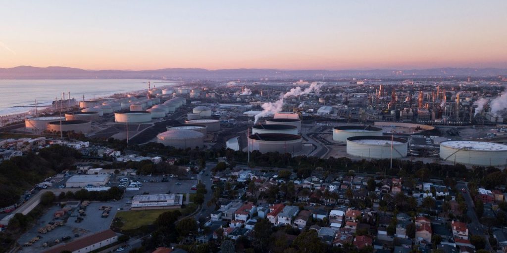 Oil prices end at highest since late April, bolstered by weaker U.S. dollar, production cuts