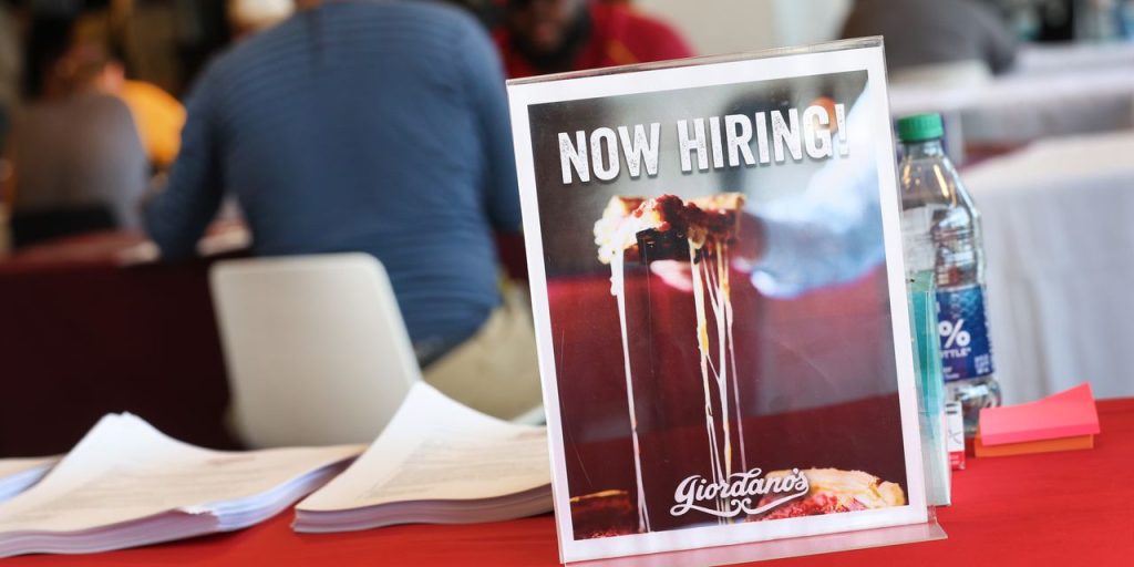 Jobless claims drop to two-month low of 228,000, as labor market is still going strong