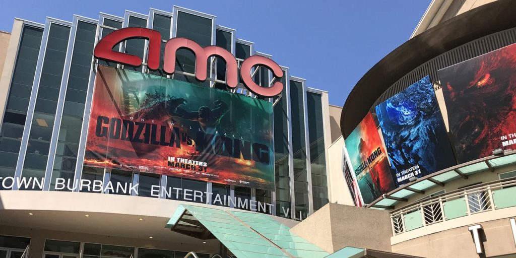 AMC, Imax, Chevron, Tesla, Domino’s, and More Stock Market Movers