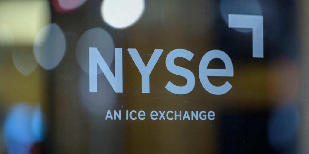 Dow ends nearly 300 points higher, with investors mulling Fed move after drop in job openings