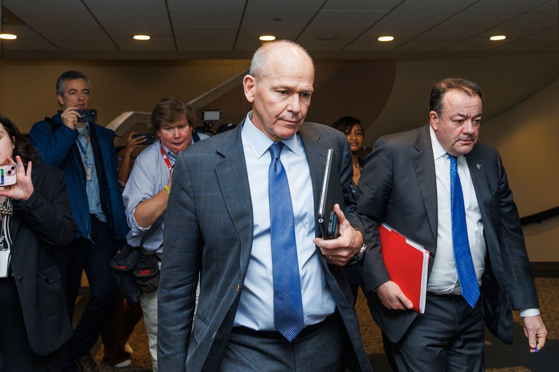 Boeing CEO Dave Calhoun is departing a meeting with Senator Tammy Duckworth Thursday as Boeing is dealing with the fallout of multiple recent safety mishaps, including a door blowing out mid-flight. (Photo by Aaron Schwartz/NurPhoto via AP)