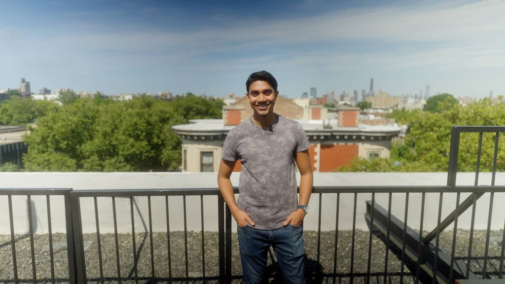 33-year-old pays $2,100/month to live with 23 roommates in Brooklyn—take a look inside